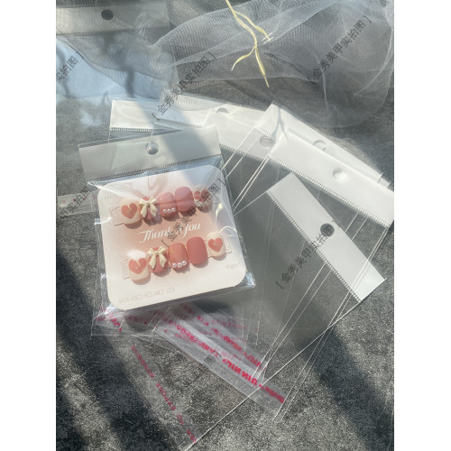 穿戴甲成品收納展示透明袋子卡頭打孔甲片卡片防塵自粘袋美甲工具