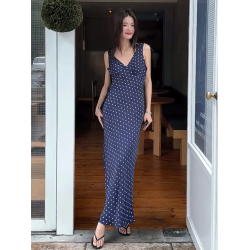 藍色波點吊帶連衣裙女2025夏季新款法式度假風高級感氣質無袖長裙