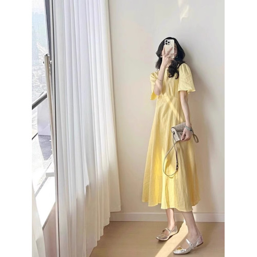 歐洲站夏季女裝2025新款茶歇法式桔梗長裙遮肚子顯瘦黃色連衣裙
