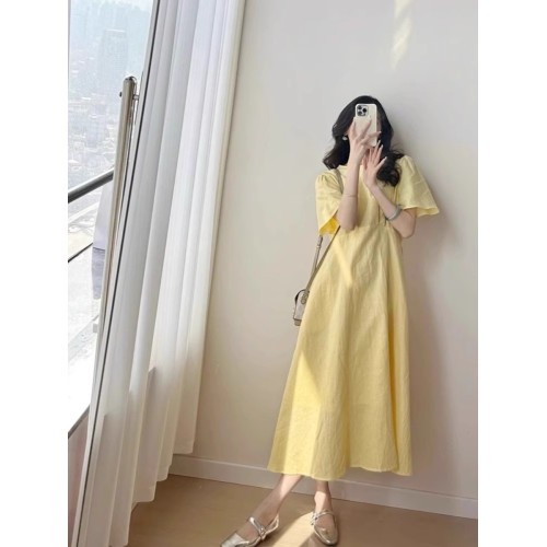 歐洲站夏季女裝2025新款茶歇法式桔梗長裙遮肚子顯瘦黃色連衣裙