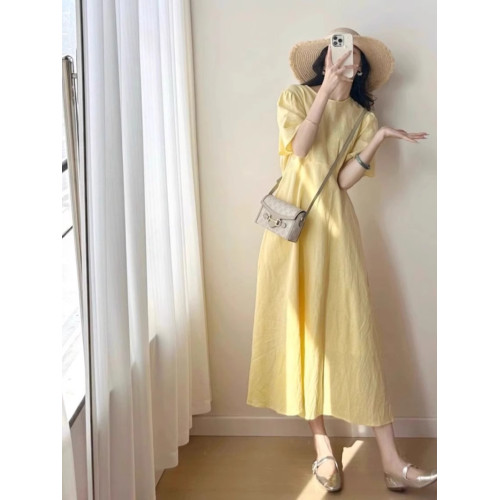 歐洲站夏季女裝2025新款茶歇法式桔梗長裙遮肚子顯瘦黃色連衣裙