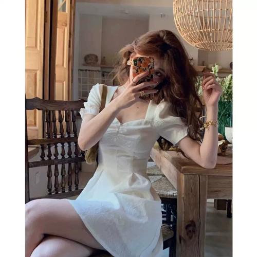 粉色甜美泡泡袖圓領連衣裙女2025夏季新款松弛感獨特漂亮收腰長裙