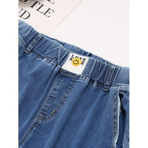 2023夏季韓版新款大碼女牛仔褲松緊腰笑臉字母彈力開叉八分褲