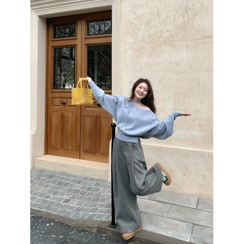 藍色針織衫女2025春新款露肩系帶高級感打底衫一字肩顯瘦開叉上衣