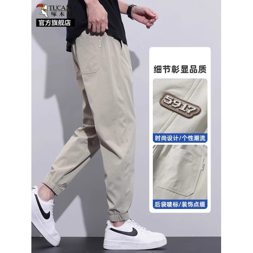 啄木鳥冰絲薄款休閒褲子男2025夏季新款彈力寬松速乾束腳運動褲K