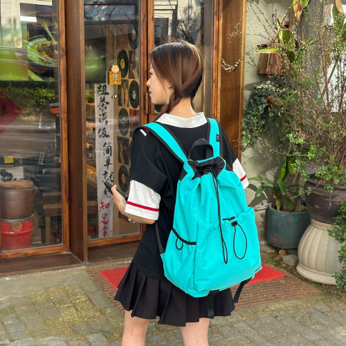 新款女大學生書包輕便旅行後背包抽繩雙肩包大容量高顔值戶外後背包女