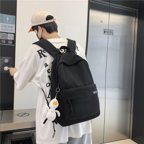 潮牌雙肩包男簡約大容量旅行後背包休閒日系初中生高中大學生書包