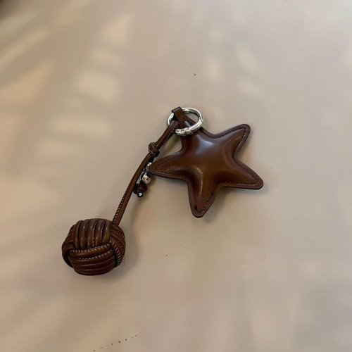 鞦鼕質感倣皮星星包包掛件鈅匙釦車鈅匙釦書包裝飾曡戴掛鏈批發