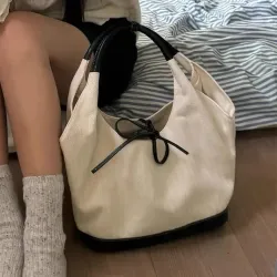 小衆復古單肩帆布包包女士2024新款韓版簡約上班小拎包腋下通勤包