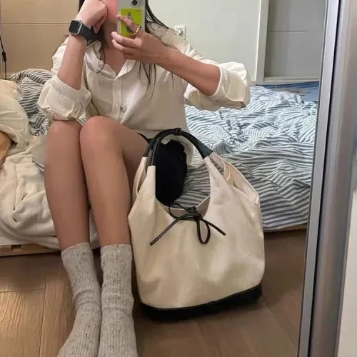 小衆復古單肩帆布包包女士2024新款韓版簡約上班小拎包腋下通勤包